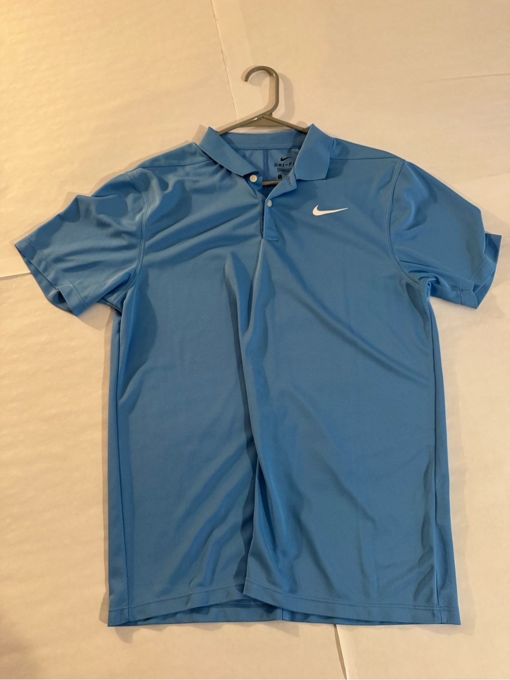 Nike Men’s Sky Blue Dri-FIT Polo with White Swoosh